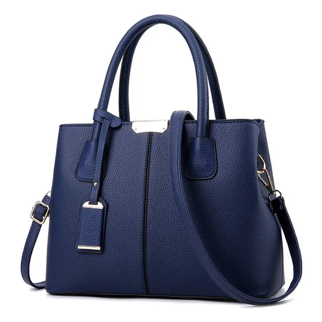 TAS TANGAN WANITA BAHAN KULIT ELEGAN - BERKAH REJEKIMU GROUP