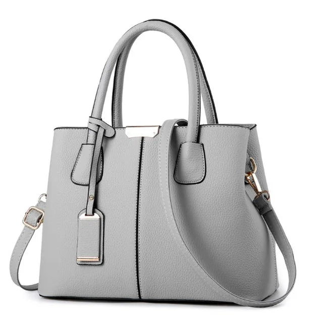 TAS TANGAN WANITA BAHAN KULIT ELEGAN - BERKAH REJEKIMU GROUP